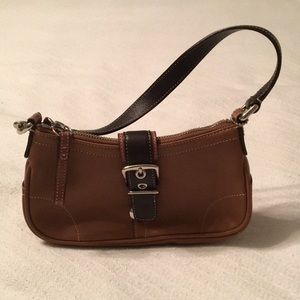 Coach small, leather purse.